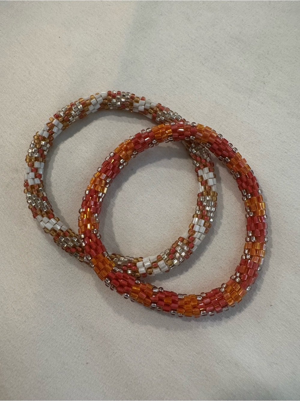 LILY AND LAURA Orange, Silver, White & Peach Beaded Coil Bracelets
